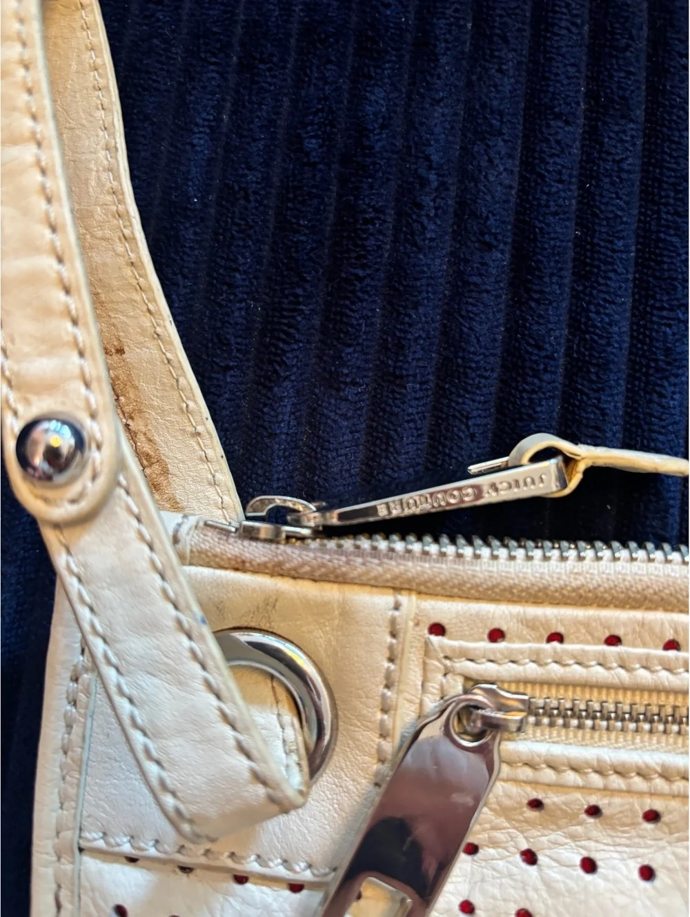 Juicy Couture Cream Perforated Leather Wristlet Clutch